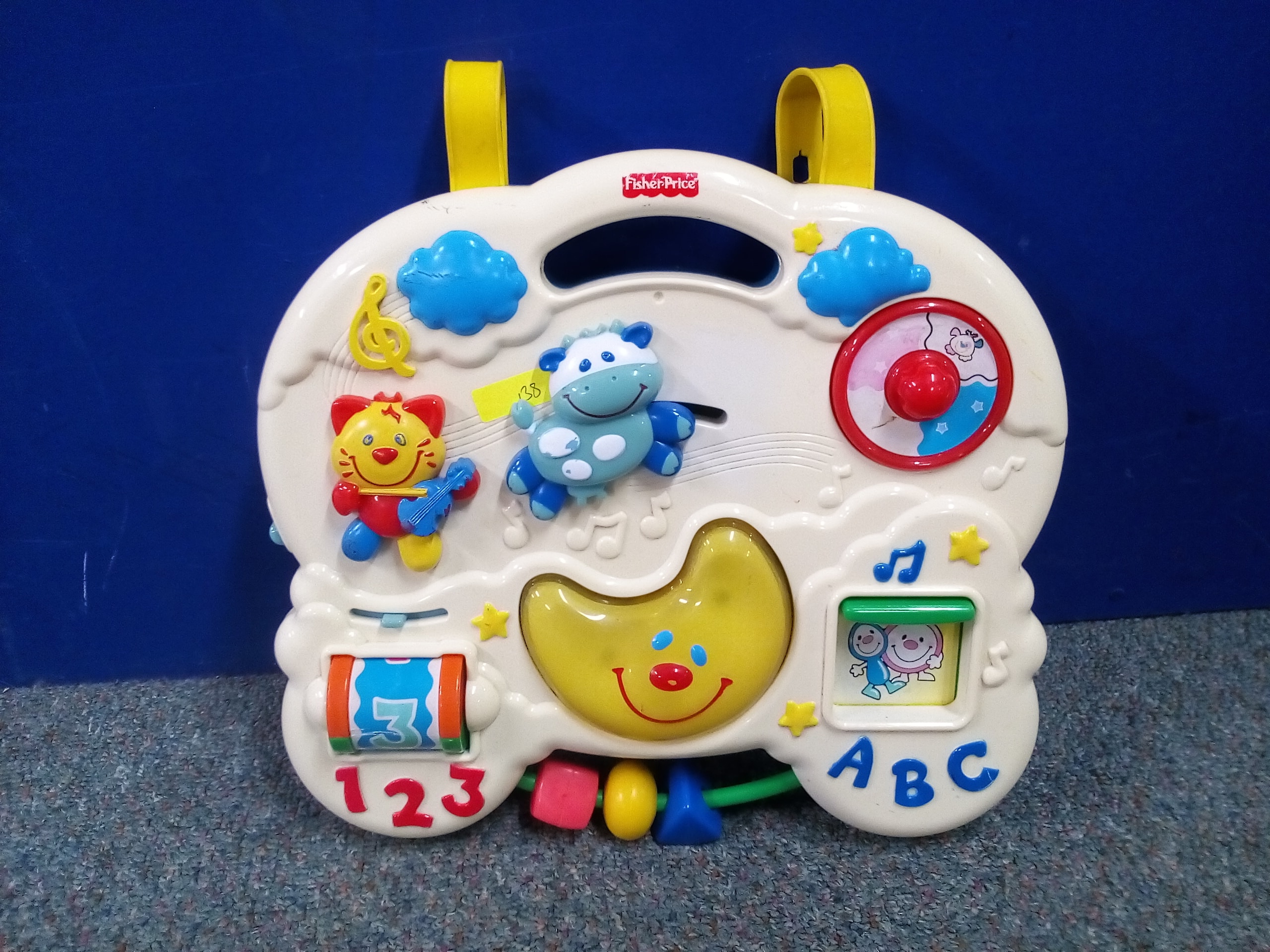 Fisher price cot sales activity centre