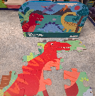 Dino puzzle in a suitcase 